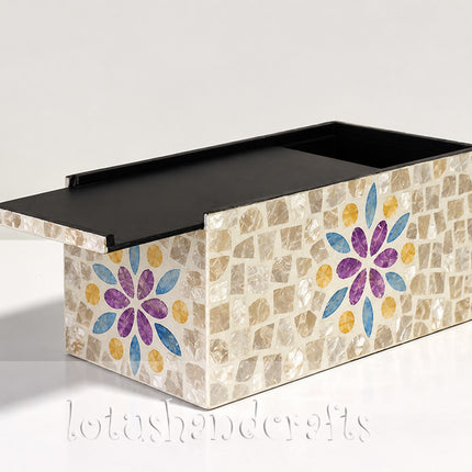 Combines everyday tissue storage with handcrafted mosaic artistry for a distinctive decorative statement.