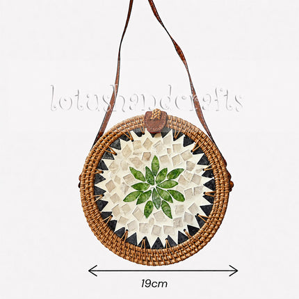 Round rattan crossbody bag with green leaf pearl mosaic inlay, size 19 cm.