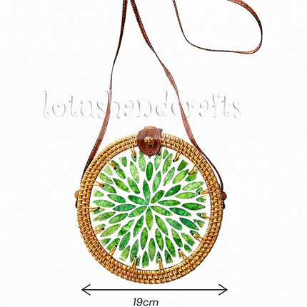 Boho round rattan crossbody bag with green leaf mother of pearl inlay in a convenient size.