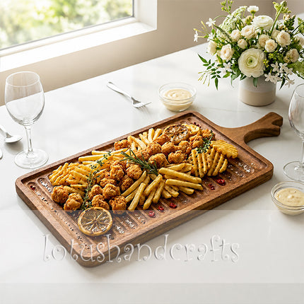 Rectangular redwood serving tray with handles for elegant food plating and modern table presentation.
