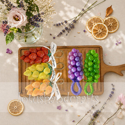 Rectangular redwood serving tray with wavy handles for elegant flatlay food presentation.