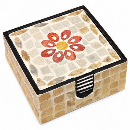 A complete set of six handmade square shell mosaic coasters neatly organized inside their coordinating storage holder on a warm wooden table.