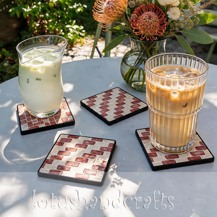 Sophisticated red-and-white shell coaster set -a graceful centerpiece for home or office.