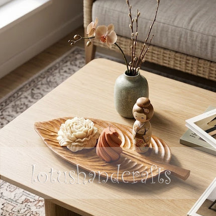 A beautiful flatlay perfectly displays the rustic redwood leaf serving tray with a handle.