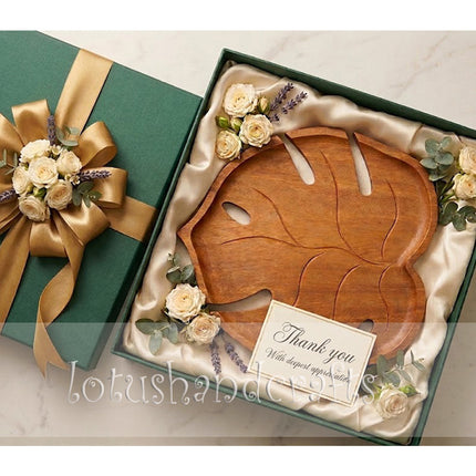 Cute redwood Monstera shaped serving tray, a thoughtful gift for nature lovers and cozy homes.