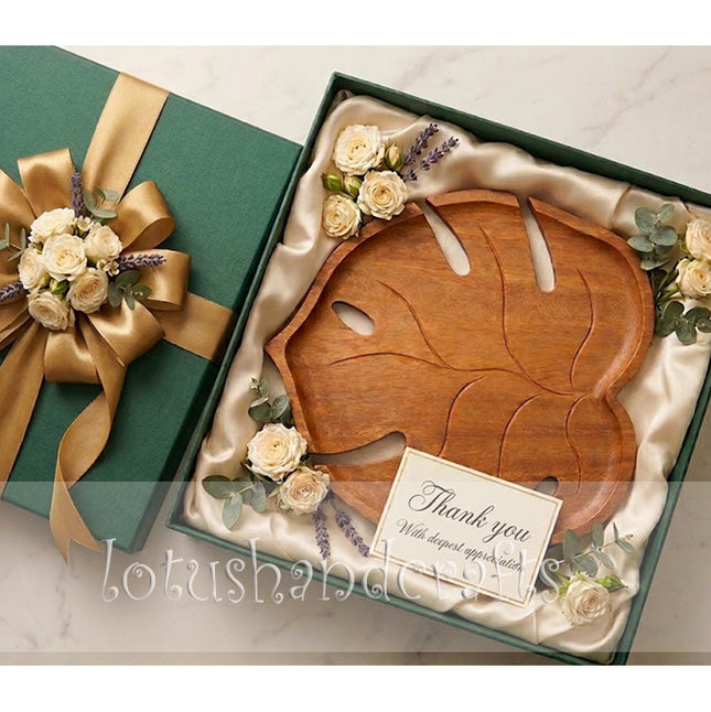 Cute redwood Monstera shaped serving tray, a thoughtful gift for nature lovers and cozy homes.