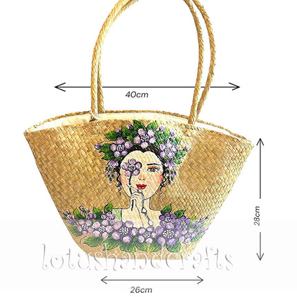 Handwoven seagrass tote bag with hand-painted floral lady artwork