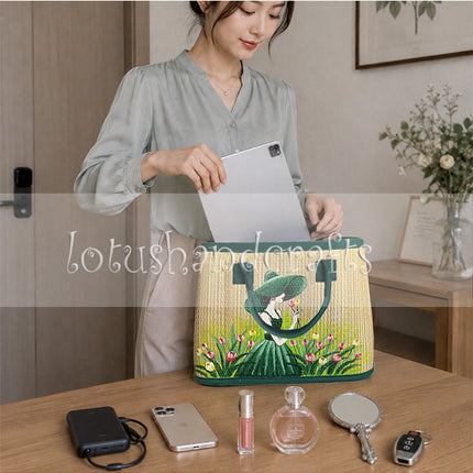 Handmade woven seagrass tote featuring elegant green lady artwork.