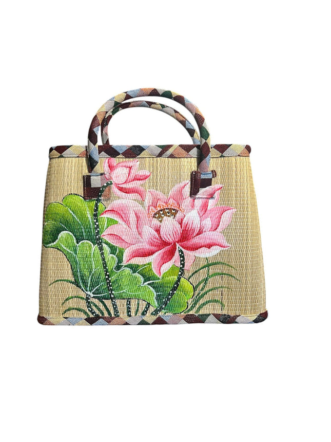 Handmade woven seagrass tote bag with an elegant hand-painted lotus design.