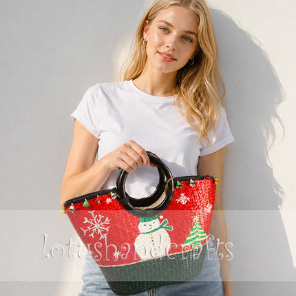 Christmas hand-painted seagrass handbag with round black handle.
