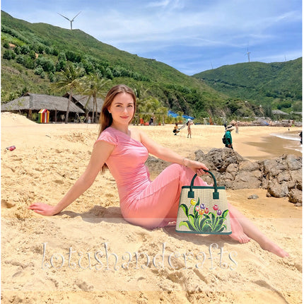 Handwoven seagrass tote bag with hand painted tulip flowers.