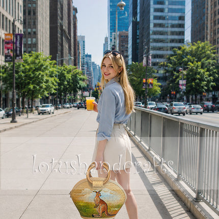 Luxury half moon seagrass tote bag with hand painted kangaroo.