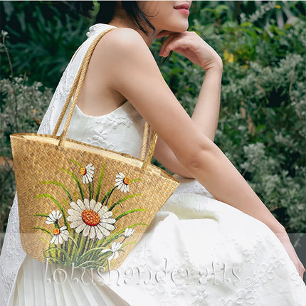 Handmade shoulder bag featuring hand-painted daisy flowers.