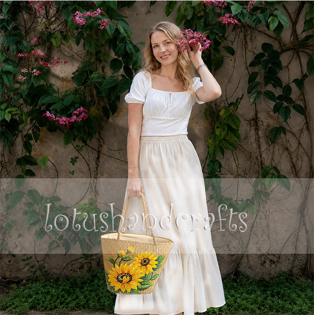 Cute hand-painted sunflower seagrass tote bag.