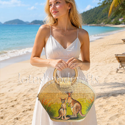 Handmade half moon shaped seagrass straw handbag with rattan handle and hand painted two kangaroos.