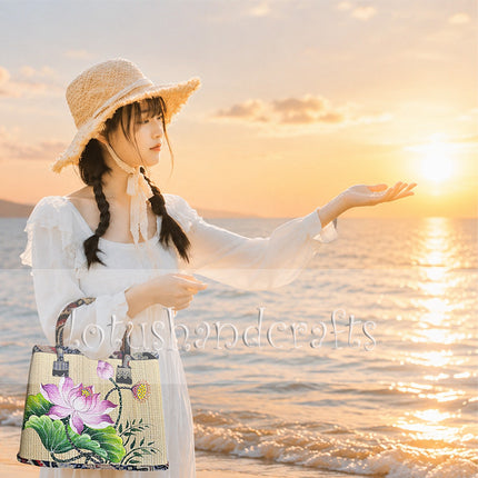 Handmade woven seagrass tote bag with a hand-painted lotus blossom.
