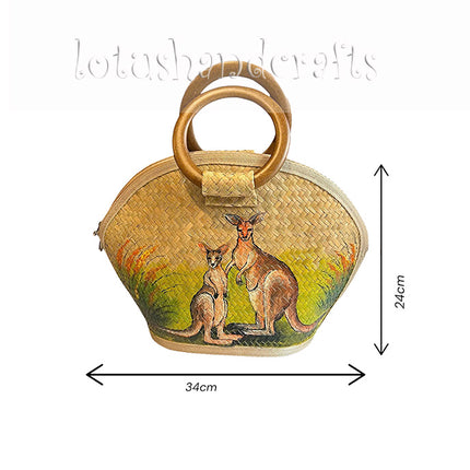 Handmade half moon shaped seagrass straw handbag with rattan handle featuring a hand painted two kangaroos design.