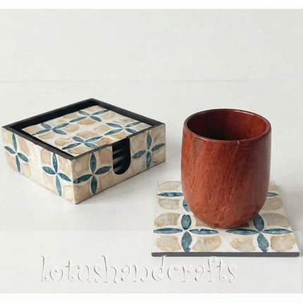 detailed view of handcrafted mother of pearl inlay work on square coasters.