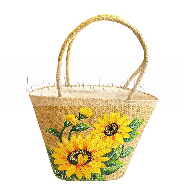 Cute seagrass tote bag with hand-painted sunflower artwork.