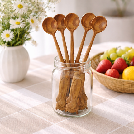 A cute cat handle wooden spoon made from natural wood for everyday use.