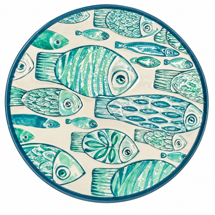A round ceramic coaster featuring intricate turquoise and teal fish patterns, perfect for protecting your tabletop while enjoying coffee or tea.