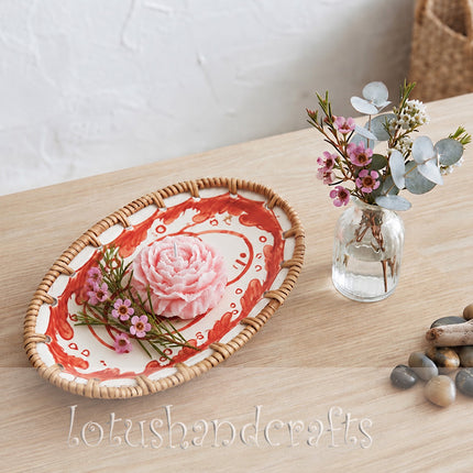 A unique handmade tray featuring playful red fish artwork inspired by the beauty of the sea.