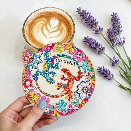 Featuring two colourful salamanders surrounded by vibrant flowers, it makes a thoughtful gift for birthdays, housewarmings and special occasions.