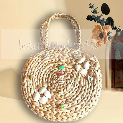 Boho Round Water Hyacinth Tote with Seashell Embellishments.