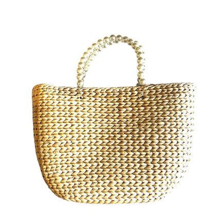 Handwoven water hyacinth tote bag with elegant pearl handles.