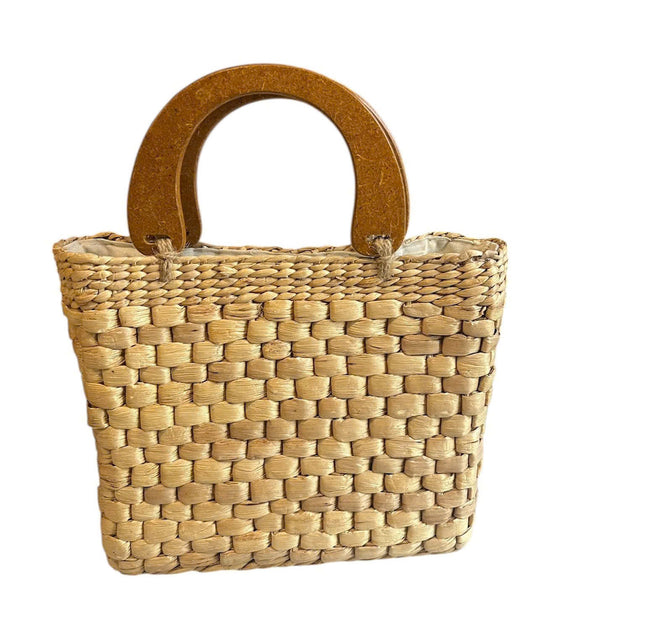 Cute handwoven water hyacinth handbag with wooden top handle.