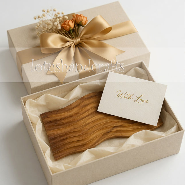 Handcrafted wave carved wooden serving board makes a thoughtful gift for warm and stylish homes.
