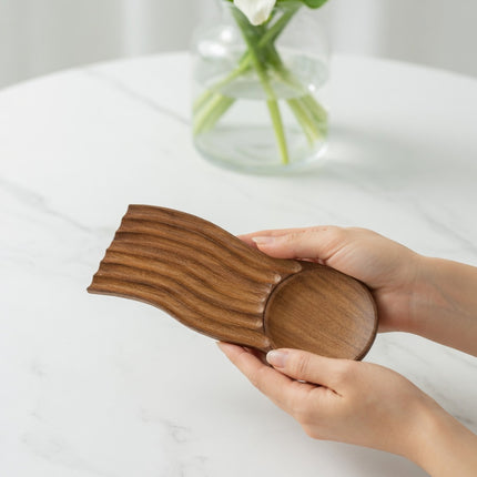 Wavy nest solid wood serving tray crafted from natural wood for elegant everyday use.