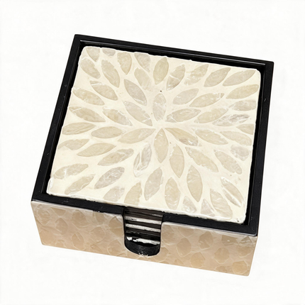 Square white mother-of-pearl coaster with intricate radiating leaf mosaic pattern.