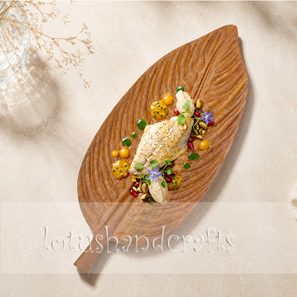 The highly durable redwood leaf serving tray with handle is perfect for everyday use.