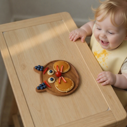 Handcrafted wooden cat shaped plate made from natural wood for everyday use.