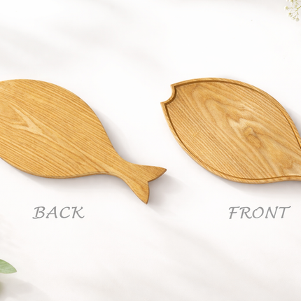 Wooden fish serving tray is durable beautiful and perfect for a cute table setting.