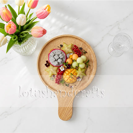 Round paddle ashwood serving tray with a safe and natural design for everyday use.