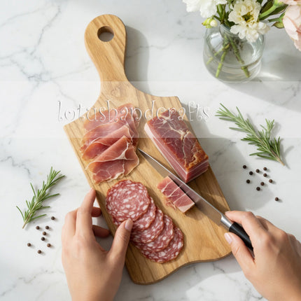 Ash wood board with handle for cutting and serving food in a simple way.