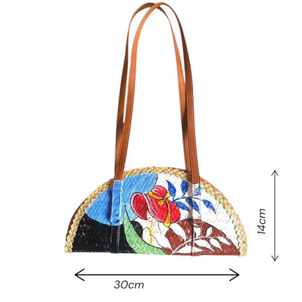 This beautifully crafted woven grass half moon bag with a painted lady design is perfect size.