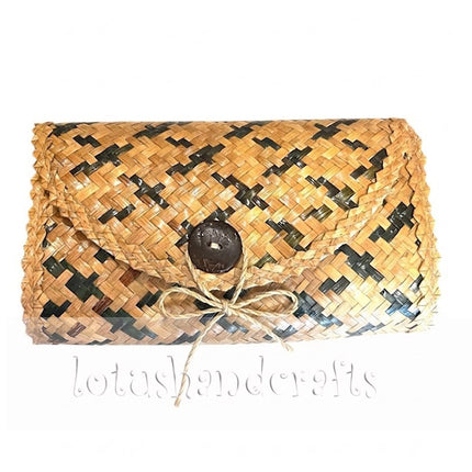 Eco friendly woven grass ziczac clutch with a natural handcrafted style for everyday elegance.
